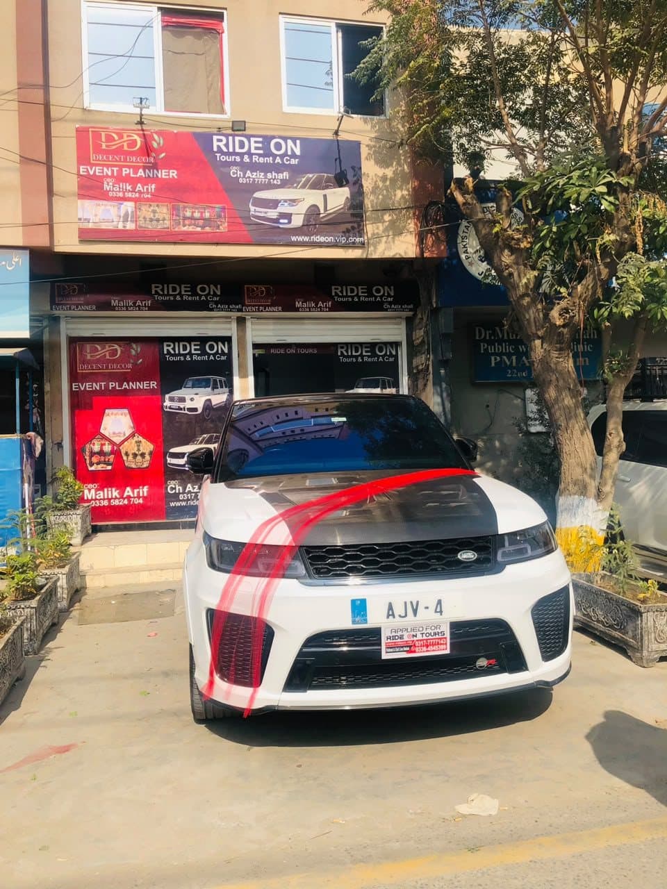 Land Rover Range Rover Sport SVR styling in white for rent at RideOnTours