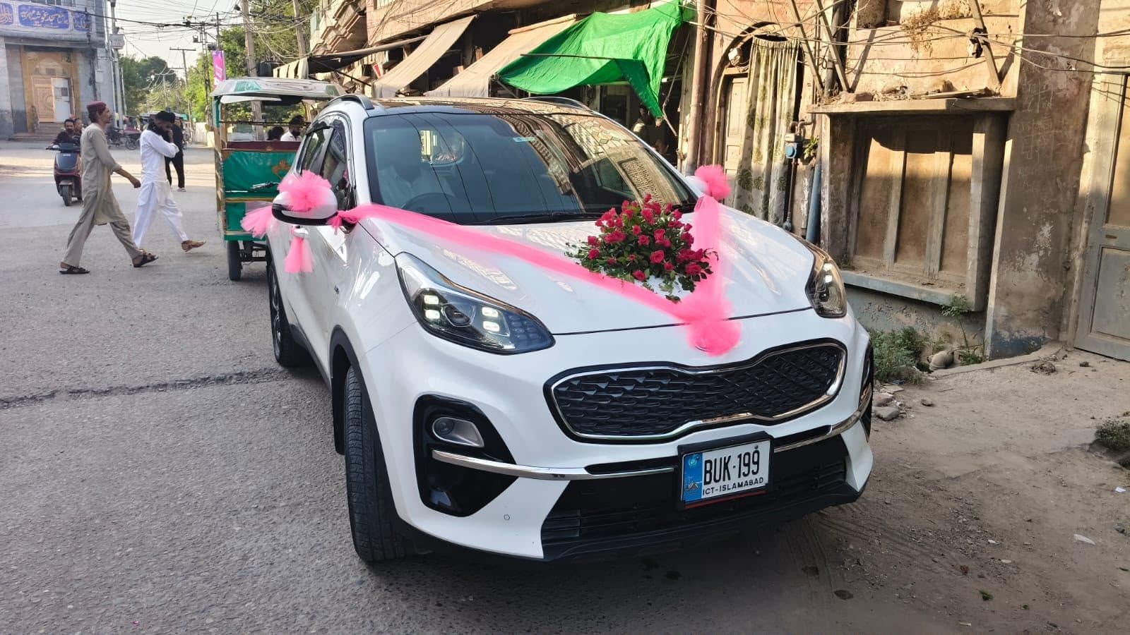 Kia Sportage in white for rent at RideOnTours