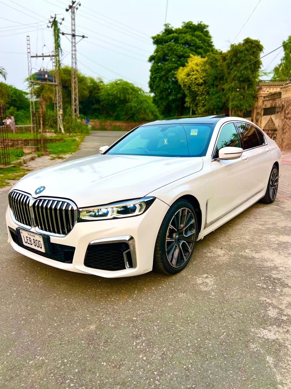BMW 7 Series Long wheelbase in white for rent at RideOnTours