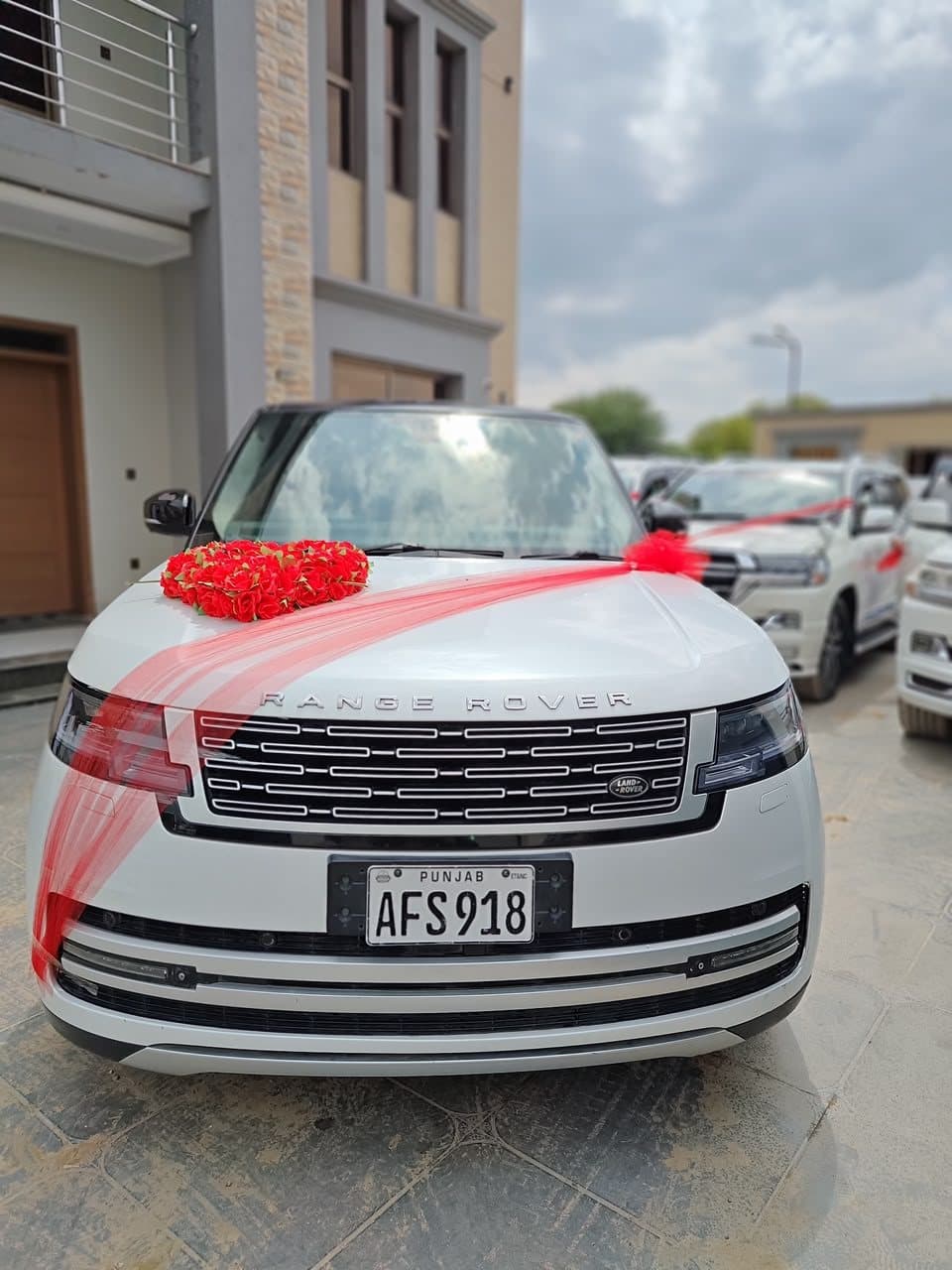 Land Rover Range Rover in white for rent at RideOnTours
